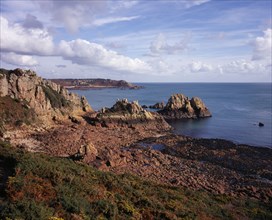 UNITED KINGDOM, Channel Islands, Jersey, "St Brelade. Beau port rocky shore with tide out, view