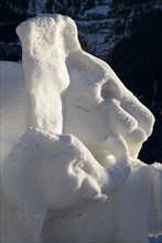 SWITZERLAND, Bernese Oberland, Grindelwald, World Snow Festival Ice Sculpture depicting elephants.