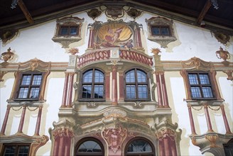 GERMANY, Bavaria, Oberammergau, Detail of the house frescoes on the east side.