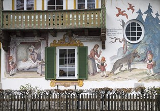 GERMANY, Bavaria, Oberammergau, Rotkappchenhaus or Red Riding Hood House. Close up of fresco detail