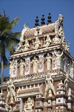 INDIA, Kerala, Ambalathara, "Carved figures on a gopuram, Ujaini Maha Kali Temple, "