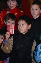 ENGLAND, London, Chinese New Year, "Children celebrating the Year of the Tiger in Chinatown, Soho.