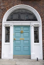 20093561 IRELAND Dublin Dublin Georgian doorway near Merrion Square with light blue door