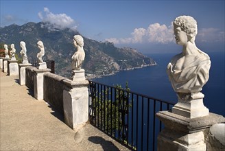 20093653 ITALY Campania Ravello Villa Cimbrone. Statues on the Belvedere of Infinity overlooking sea