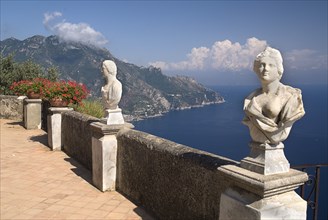 20093654 ITALY Campania Ravello Villa Cimbrone. Statues on the Belvedere of Infinity overlooking sea