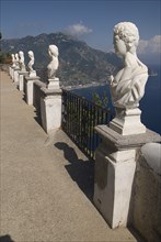 20093655 ITALY Campania Ravello Villa Cimbrone. Statues on the Belvedere of Infinity overlooking sea