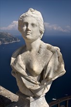 20093657 ITALY Campania Ravello Villa Cimbrone. Statue on Belvedere of Infinity overlooking sea
