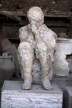 20093690 ITALY Campania Pompeii Plaster cast of the victim known as The muleteer as he uses his hands to protect his face