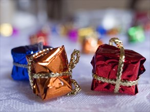 FESTIVALS, Religious, Christmas, Minature wrapped Christmas presents used as festive dinner table