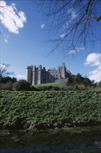 ENGLAND, West Sussex, Arundel, Arundel Castle viewed from the riverbank.