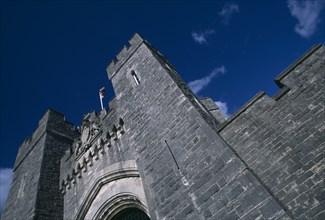 ENGLAND, West Sussex, Arundel, Arundel Castle. Angled part view of the entrance gate and crenelated