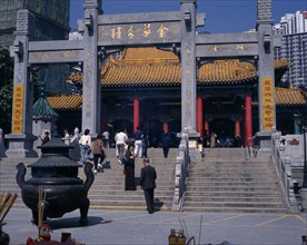 CHINA, Hong Kong, Kowloon, "Wong Tai Sin taoist temple established in 1921.  Visitors on flight of