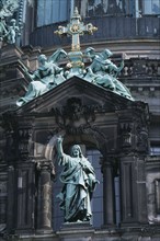 GERMANY, Berlin, Berlin Cathedral. Exterior detail of statues and Christian iconography.