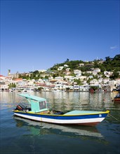 WEST INDIES, Grenada, St George, Fishing boat moored in the Carenage harbour of the capital city of