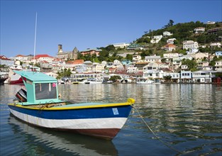 WEST INDIES, Grenada, St George, Fishing boat moored in the Carenage harbour of the capital city of