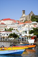 WEST INDIES, Grenada, St George, Water taxi boats moored in the Carenage harbour of the capital