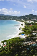 WEST INDIES, Grenada, St George, Waves of the aquamarine sea breaking on the two mile stretch of
