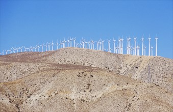 USA, California, Desert, Wind powered generators on top of a mountain
