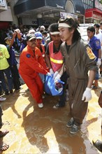 THAILAND, Phang Nga District, Phuket, "Tsunami carnage the day after. Bodies of foreign tourists
