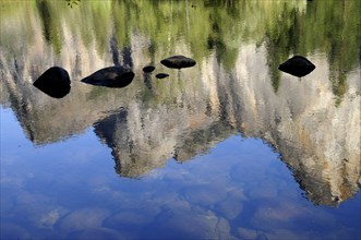 USA, California, Yosemite NP, "Reflection in Merced River of mountains, Valley floor"