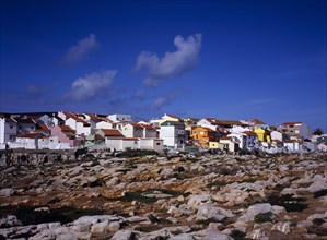 PORTUGAL, Estremadura, Ribatejo, Peniche. Atlantic Ocean town. View across low cliffs and rocky