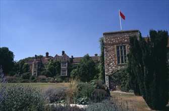 ENGLAND, East Sussex, Glyndebourne, View across the garden towards the country house and opera