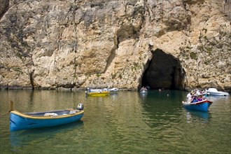 MALTA, Gozo, Dwejra, "Tourists and boats in the Inland Sea, Il-Qawra."