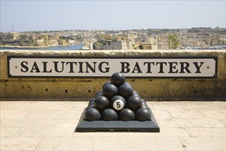 MALTA, Valletta, "Cannonballs, Saluting Battery sign, Saluting Battery, Upper Barracca Gardens, and