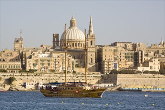 MALTA, Valletta, "View of the capital city of Valletta from Sliema, and large yacht in foreground"