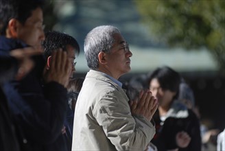 JAPAN, Honshu, Tokyo, "Jingumae - in front of Meijijingu shrine, gray haired man about sixty years