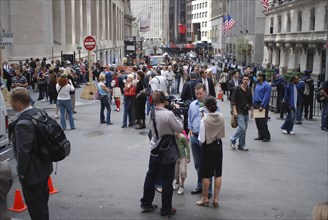 USA, New York, Manhattan, "Financial District, Wall Street, Crowds of people and news reporter