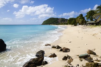 WEST INDIES, St Vincent & The Grenadines, Canouan, South Glossy Beach in Glossy bay with footprints