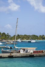 WEST INDIES, St Vincent & The Grenadines, Union Island, Inter island supply boat unloading