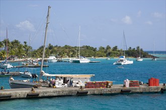 WEST INDIES, St Vincent & The Grenadines, Union Island, Inter island supply boat unloading