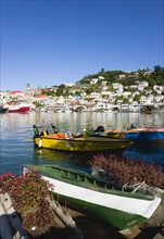 WEST INDIES, Grenada, St Georges, The Carenage harbour in the capital with houses lining the