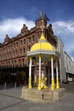 IRELAND, North, Belfast, "Victoria Square, Yellow coloured Victorian Jaffe drinking fountain