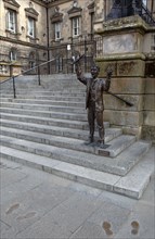 IRELAND, North, Belfast, "Custom House Square, Bronze statue of The Speaker on the steps. The site