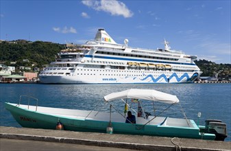 WEST INDIES, Grenada, St George, Cruise ship liner Aida Aura and local tourist boat moored on