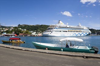 WEST INDIES, Grenada, St George, Cruise ship liner Aida Aura and local tourist boat moored on