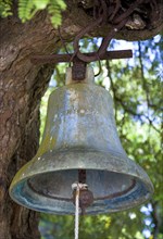 WEST INDIES, Grenada, St Patrick, The bell hanging from a tree at Belmont Estate Plantation