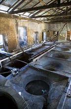 WEST INDIES, Grenada, St Patrick, The ancient copper vats for boiling the sugarcane juice at the