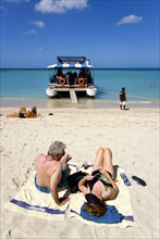 WEST INDIES, Grenada, St George, Tourists from cruise ships on BBC Beach in Morne Rouge Bay in the