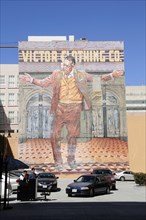 USA, California, Los Angeles, "Mural depicting clothing history downtown, fashion district. Valet