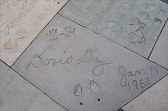 USA, California, Los Angeles, "Doris Day's tiny footprint, Mann's Chinese Theatre, Hollywood.