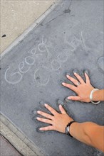 USA, California, Los Angeles, "Fitting into George Clooney's hands, Mann's Chinese Theatre,