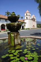 USA, California, Santa Barbara, Water fountain & Mission Santa Barbara