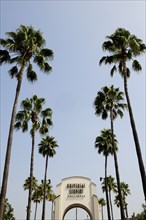 USA, California, Los Angeles, Palms & entrance to Universal Studios