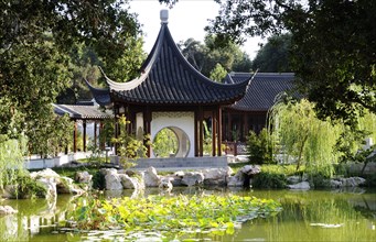 USA, California, Los Angeles, "View across lake to Terrace of the Jade Mirror, Chinese Garden, The