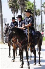 USA, California, Los Angeles, "Mounted police officers, Venice Beach"