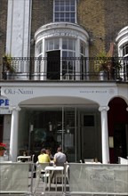 ENGLAND, East Sussex, Brighton, "New Road pedestrianised area, Oki Nami Japanese Restaurant."